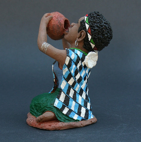 African Woman Sculpture Drinking from Pot 5.75" X 3.5" X 3.5"